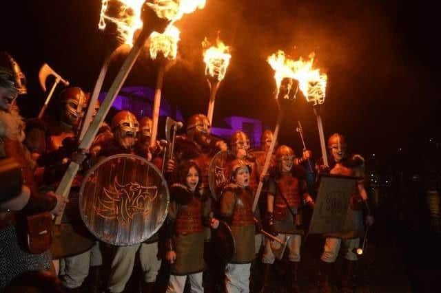 Men and boys in their jarl squad at Up Helly Aa may soon be joined by women