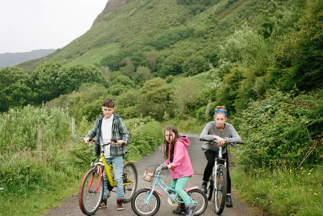 Brother and sisters on bikes on Eigg. Photographer Danny North immersed himself in island life for his series As I Found Her with a number of photographs set to be acquired by Scottish National Portrait Gallery. PIC: Danny North.