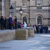 Members of the public queue to pay their respects to the Queen as she lies at rest at St Giles' Cathedral