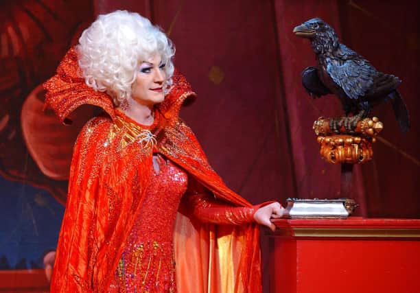 Paul O'Grady as Lily Savage in pantomime in 2004. Picture: Yui Mok/PA