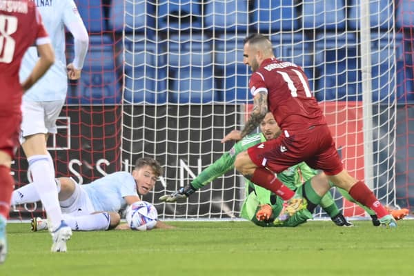 Armenia's Tigran Barseghyan, right, tries to score past Scotland's goalkeeper Craig Gordon during the UEFA Nations League soccer match between Armenia and Scotland at the Vazgen Sargsyan stadium in Yerevan, Armenia.