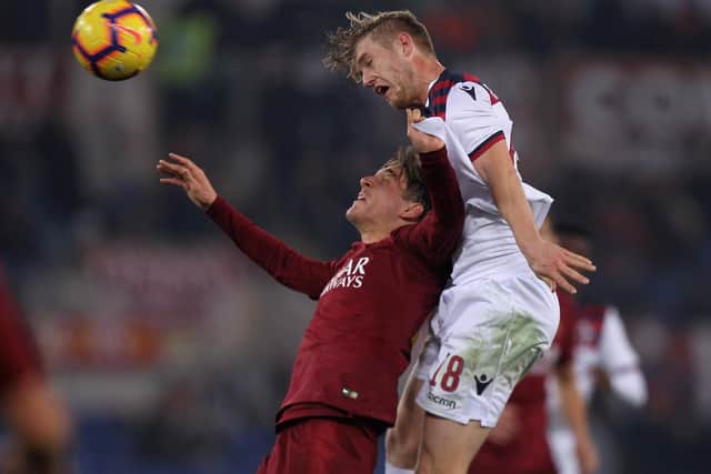 Filip Helander wins an aerial duel with Roma's Nicolo Zaniolo during his last season with Bologna before his move to Rangers in the summer of 2019.  (Photo by Paolo Bruno/Getty Images)