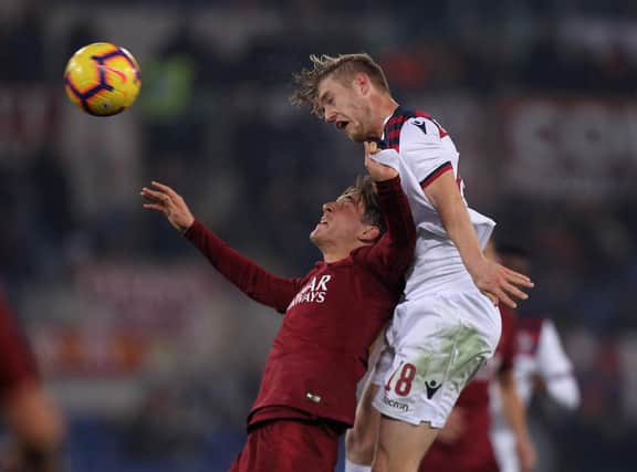 Filip Helander wins an aerial duel with Roma's Nicolo Zaniolo during his last season with Bologna before his move to Rangers in the summer of 2019.  (Photo by Paolo Bruno/Getty Images)