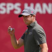 David Law acknowledges the crowd after finishing his third round with a birdie in the ISPS Handa Championship at PGM Ishioka GC in Japan. Picture: Yoshimasa Nakano/Getty Images.
