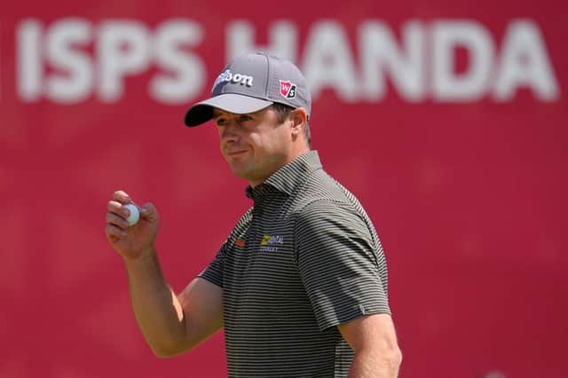 David Law acknowledges the crowd after finishing his third round with a birdie in the ISPS Handa Championship at PGM Ishioka GC in Japan. Picture: Yoshimasa Nakano/Getty Images.