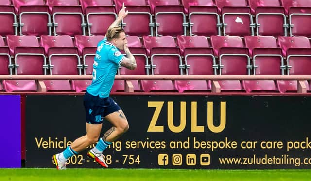 Jason Cummings celebrates his goal against Hearts.