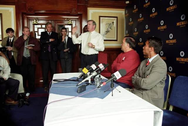 Giovanni van Bronckhorst (right) with manager Dick Advocaat on the day he was introduced to the media as a Rangers player in the Blue Room at Ibrox in 1998. (Photo by SNS Group).