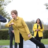 Nicola Sturgeon and Angus Robertson greet each other during a visit to Airdrie on Sunday (Picture: Andrew Milligan/pool/Getty Images)