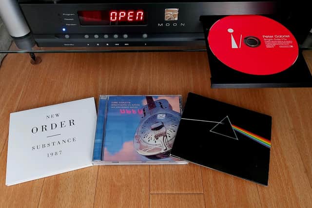 CDs are a lot less fiddly and longer playing than vinyl records: just pop in the tray and press play. Picture: Scott Reid