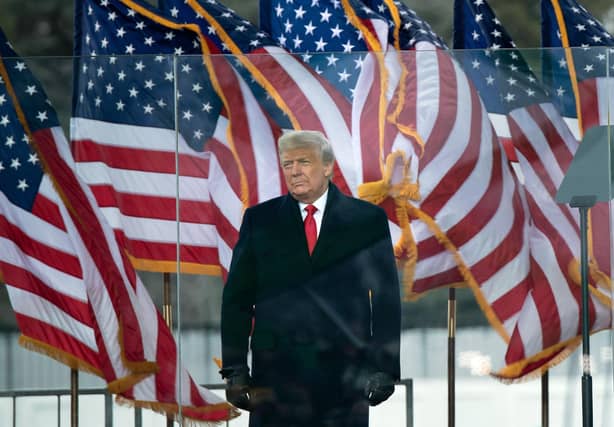 US president Donald Trump arrives to speak to supporters from The Ellipse near the White House. Picture: Brendan Smialowski/AFP via Getty Images