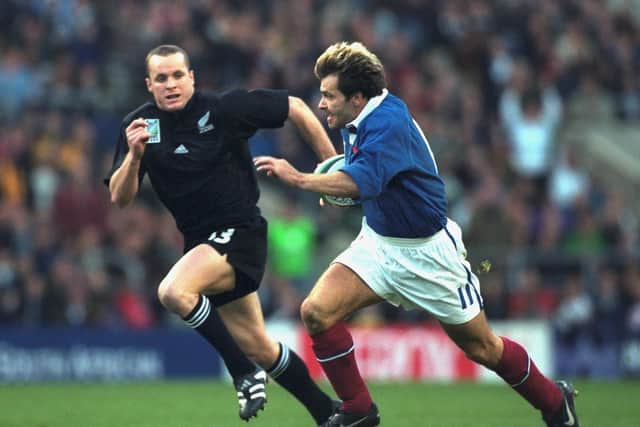 Christophe Dominici takes on Christian Cullen of New Zealand during the 1999 World Cup semi-final at Twickenham. France won 43-31. Picture: Alex Livesey/Allsport/Getty Images