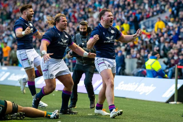 Ewan Ashman celebrates his second half try. (Photo by Ross Parker / SNS Group)