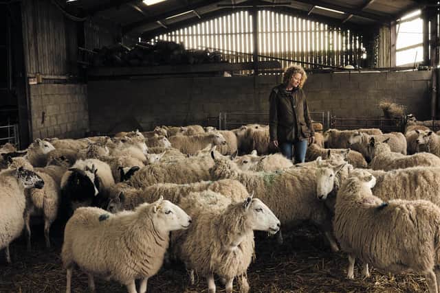 Kate Humble with some of her sheep at the farm in Monmouth, Wales, she shares with her husband. Pic: Andrew Montgomery