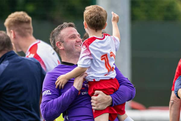 Spartans' Blair Carswell celebrates with young Ollie after defeating Dundee United.