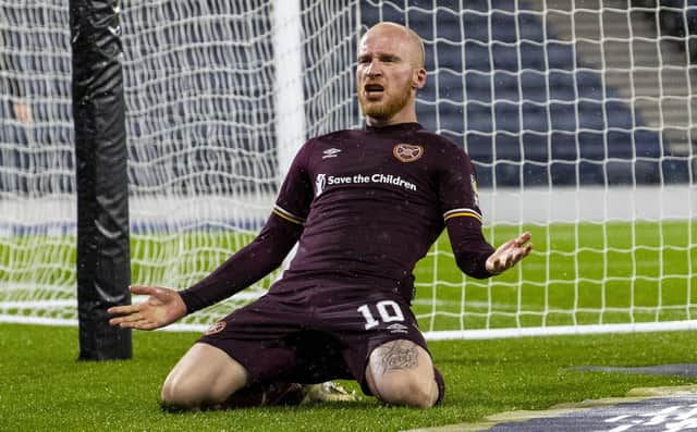 Liam Boyce celebrates after scoring to make it 2-1 during a Scottish Cup semi-final match between Hearts and Hibernian at in October 2020.