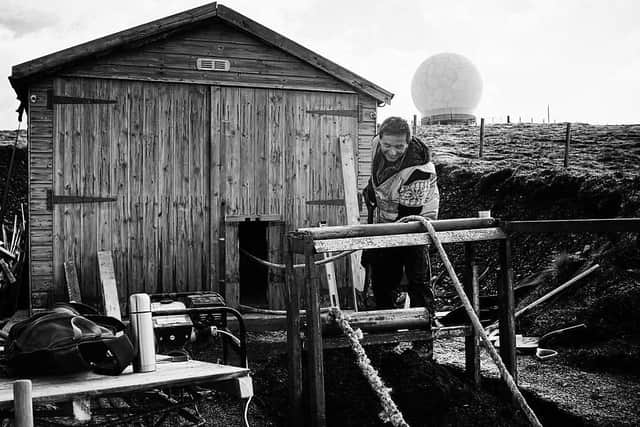 Anjo Abelaira, hard at work on the doors to the engine shed, at the top of the ski tow on Lowther Hill PIC: Ross Dolder / Lowther Hills Ski Club