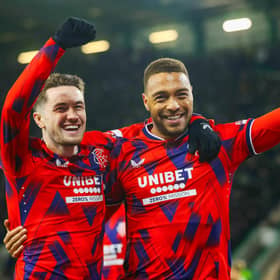 Rangers striker Cyriel Dessers celebrates with Scott Wright after scoring in the 3-0 win over Hibs. (Photo by Craig Williamson / SNS Group)