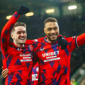 Rangers striker Cyriel Dessers celebrates with Scott Wright after scoring in the 3-0 win over Hibs. (Photo by Craig Williamson / SNS Group)