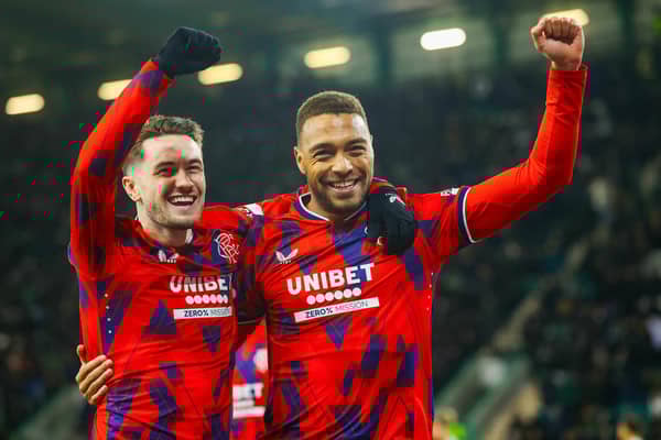 Rangers striker Cyriel Dessers celebrates with Scott Wright after scoring in the 3-0 win over Hibs. (Photo by Craig Williamson / SNS Group)