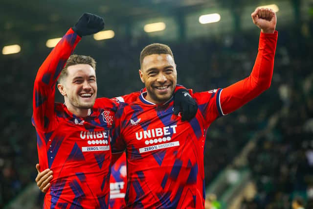 Rangers striker Cyriel Dessers celebrates with Scott Wright after scoring in the 3-0 win over Hibs. (Photo by Craig Williamson / SNS Group)