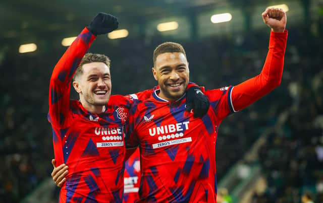 Rangers striker Cyriel Dessers celebrates with Scott Wright after scoring in the 3-0 win over Hibs. (Photo by Craig Williamson / SNS Group)