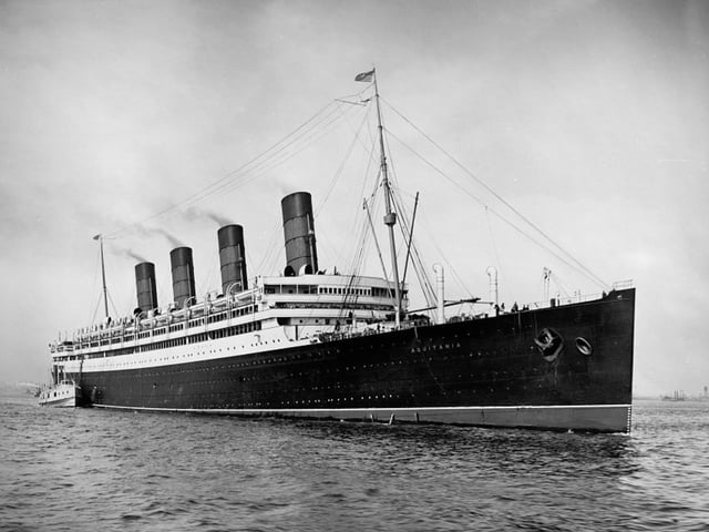 The RMS Aquitania was an ocean liner from the Cunard Line which served between 1914 and 1950. Designed by Leonard Peskett and built by John Brown & Company in Clydebank, she was first launched on April 21 1913. Her maiden voyage took place from Liverpool to New York the year following on May 30. In her 36 years, the vessel served military duty in both world wars and returned to passenger service after both. Her crew affectionately called her “Old Irrepressible” as, unlike the Lusitania, she was the only major liner to survive each world war.