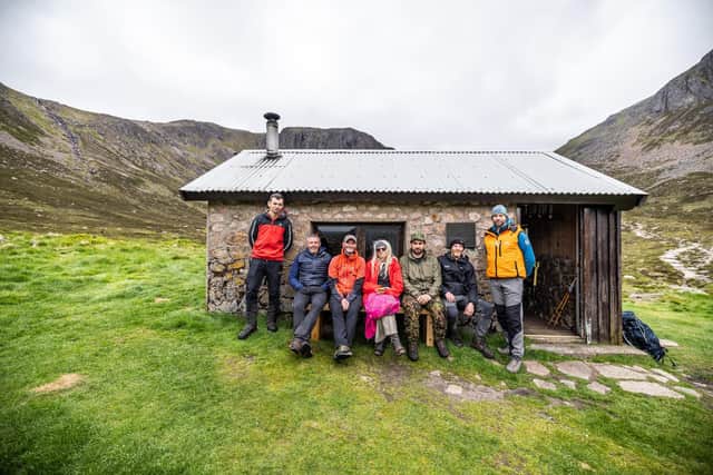 BMRT with lead artist Claudia Zeiske at Hutchison Hut with the installed bench. (Pic:Paul Campbell)
