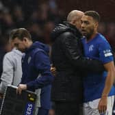 Philippe Clement speaks to Cyriel Dessers during Rangers' win over Dundee.