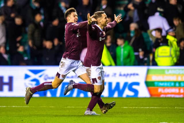 Hearts left-back Aaron Hickey, left, is wanted by Celtic. Picture: SNS