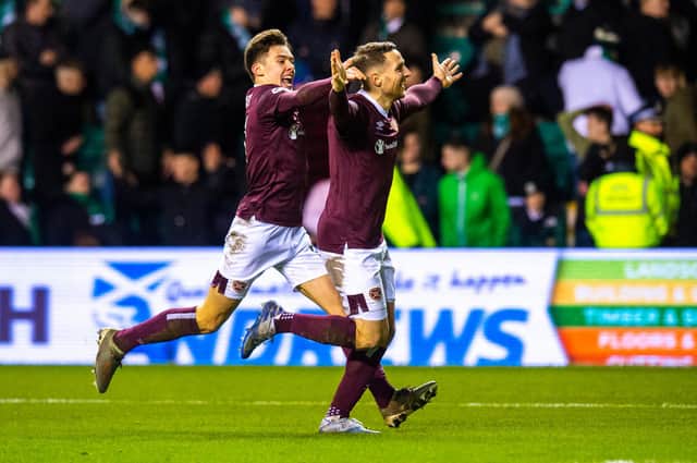 Hearts left-back Aaron Hickey, left, is wanted by Celtic. Picture: SNS