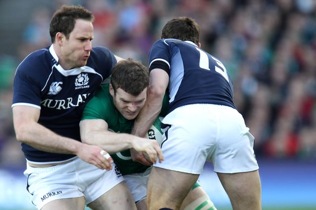 Morrison, pictured left tackling Ireland's Gordon D'Arcy, spent his entire professional career with Glasgow Warriors before retiring in 2013 due to persistent knee issues. Won 35 caps and is now a chartered accountant.