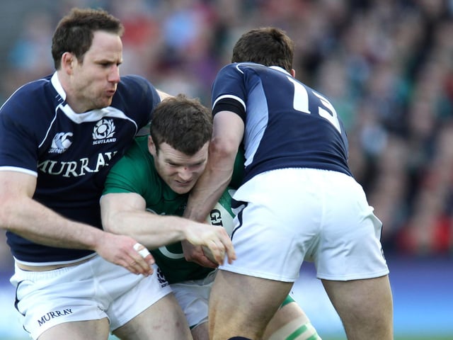 Morrison, pictured left tackling Ireland's Gordon D'Arcy, spent his entire professional career with Glasgow Warriors before retiring in 2013 due to persistent knee issues. Won 35 caps and is now a chartered accountant.