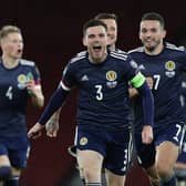 Andy Robertson of Scotland celebrates after his team's victory in the penalty shoot out during the UEFA EURO 2020 Play-Off semi-finals match between Scotland and Israel at Hampden Park on October 08, 2020 in Glasgow, Scotland. (Photo by Ian MacNicol/Getty Images)