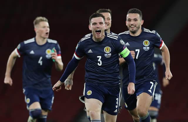 Andy Robertson of Scotland celebrates after his team's victory in the penalty shoot out during the UEFA EURO 2020 Play-Off semi-finals match between Scotland and Israel at Hampden Park on October 08, 2020 in Glasgow, Scotland. (Photo by Ian MacNicol/Getty Images)
