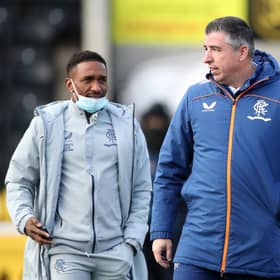 Jermain Defoe (left) and new Rangers first team coach Roy Makaay in conversation before Sunday's Premiership fixture at Livingston. (Photo by Ian MacNicol/Getty Images)