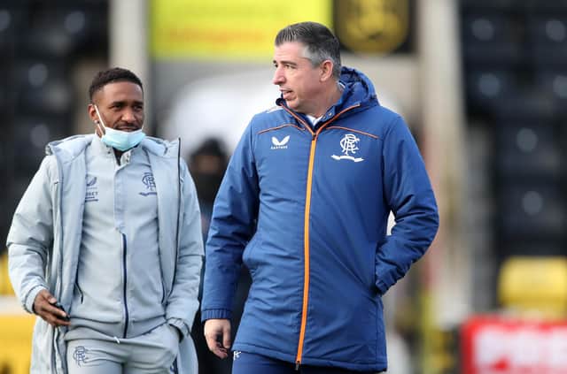 Jermain Defoe (left) and new Rangers first team coach Roy Makaay in conversation before Sunday's Premiership fixture at Livingston. (Photo by Ian MacNicol/Getty Images)