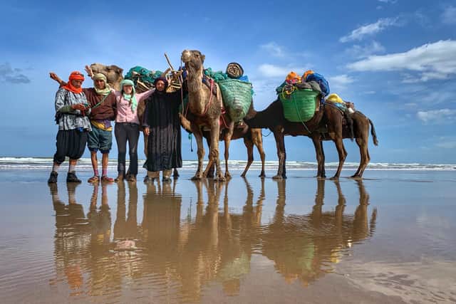 Alice Morrison, her team and camels reach the coast after their expedition across Morocco.