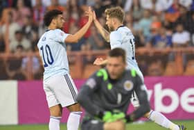 Scotland's Stuart Armstrong, right, celebrates with Che Adams after scoring his side's first goal against Armenia.