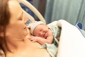 Mother with her new born baby girl in the hospital.