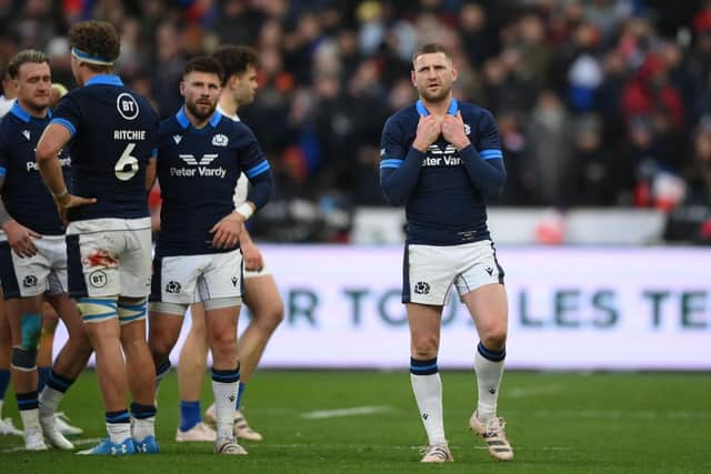 Scotland scrum-half Finn Russell looks dejected after the 32-21 defeat to France in Paris. (Photo by FRANCK FIFE/AFP via Getty Images)