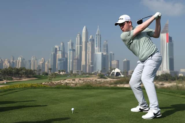 Bob MacIntyre hits off the eighth tee at Emirates Golf Club in one of his practice rounds for the Slync.io Dubai Desert Classic. Picture: Warren Little/Getty Images.