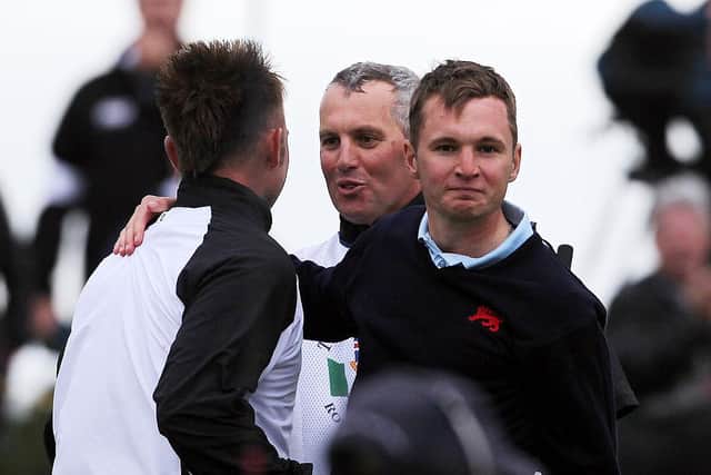 Micheal Stewart celebrates with GB&I team-mate Andy Sullivan after winning his singles match on day two of the 2011 Walker Cup at Royal Aberdeen. Picture: Ian MacNicol/Getty Images.