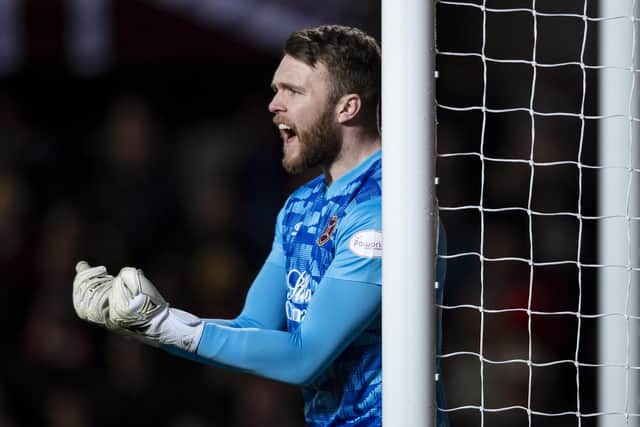 Zander Clark made his Hearts debut when coming on for Craig Gordon on Christmas Eve against Dundee United.