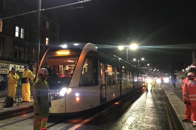 Trams running through the night in Leith