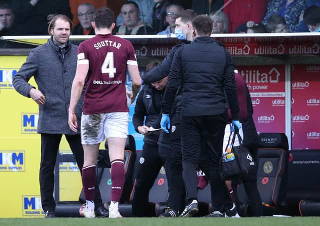 Hearts' John Souttar goes off injured against Dundee United.  (Photo by Alan Harvey / SNS Group)
