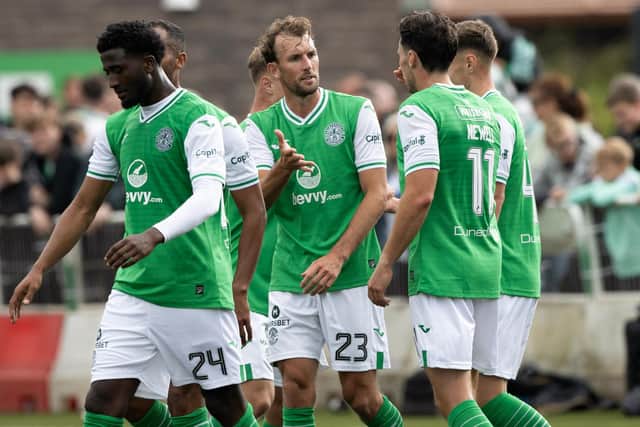 Hibs striker Christian Doidge (centre) is one of a clutch of players who have returned to the first-team squad after loan spells away last season.