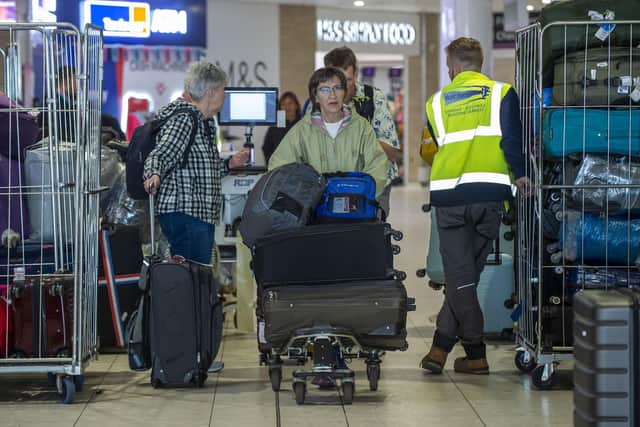Edinburgh Airport staff are to deliver mislaid bags themselves in an attempt to get them to passengers quicker. (Photo by Lisa Ferguson/The Scotsman)