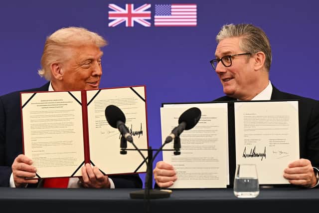 Prime Minister Sir Keir Starmer and US President Donald Trump announce an agreement between the two countries. PIC: Leon Neal/PA Wire