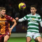 Motherwell's Blair Spittal and Celtic's Matt O'Riley during a Premier Sports Cup match between Motherwell and Celtic at Fir Park, on October 19, 2022, in Motherwell, Scotland.  (Photo by Craig Foy / SNS Group)