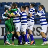 The Morton players celebrate with goalkeeper Jack Hamilton after their penalty shootout victory against Inverness.